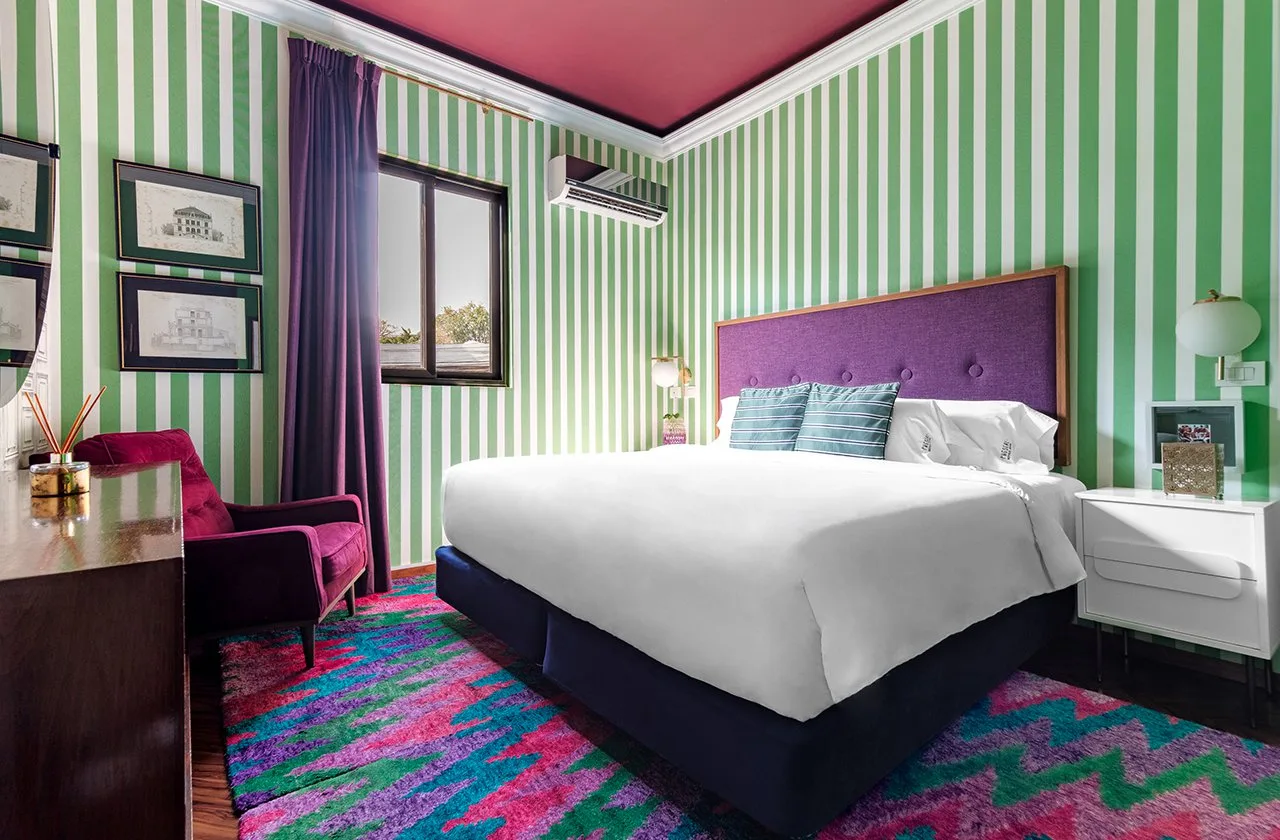 Cama de la habitación Junior Suite en Pug Seal Anatole France, Polanco