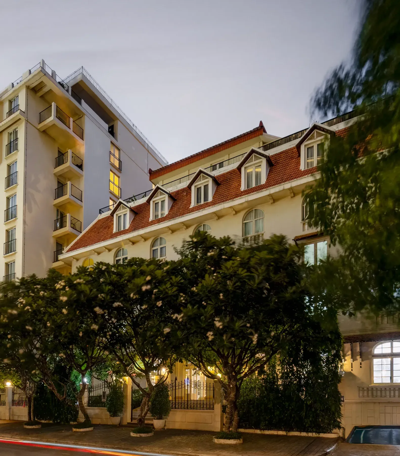 Central Mansions exterior and landscaped grounds.