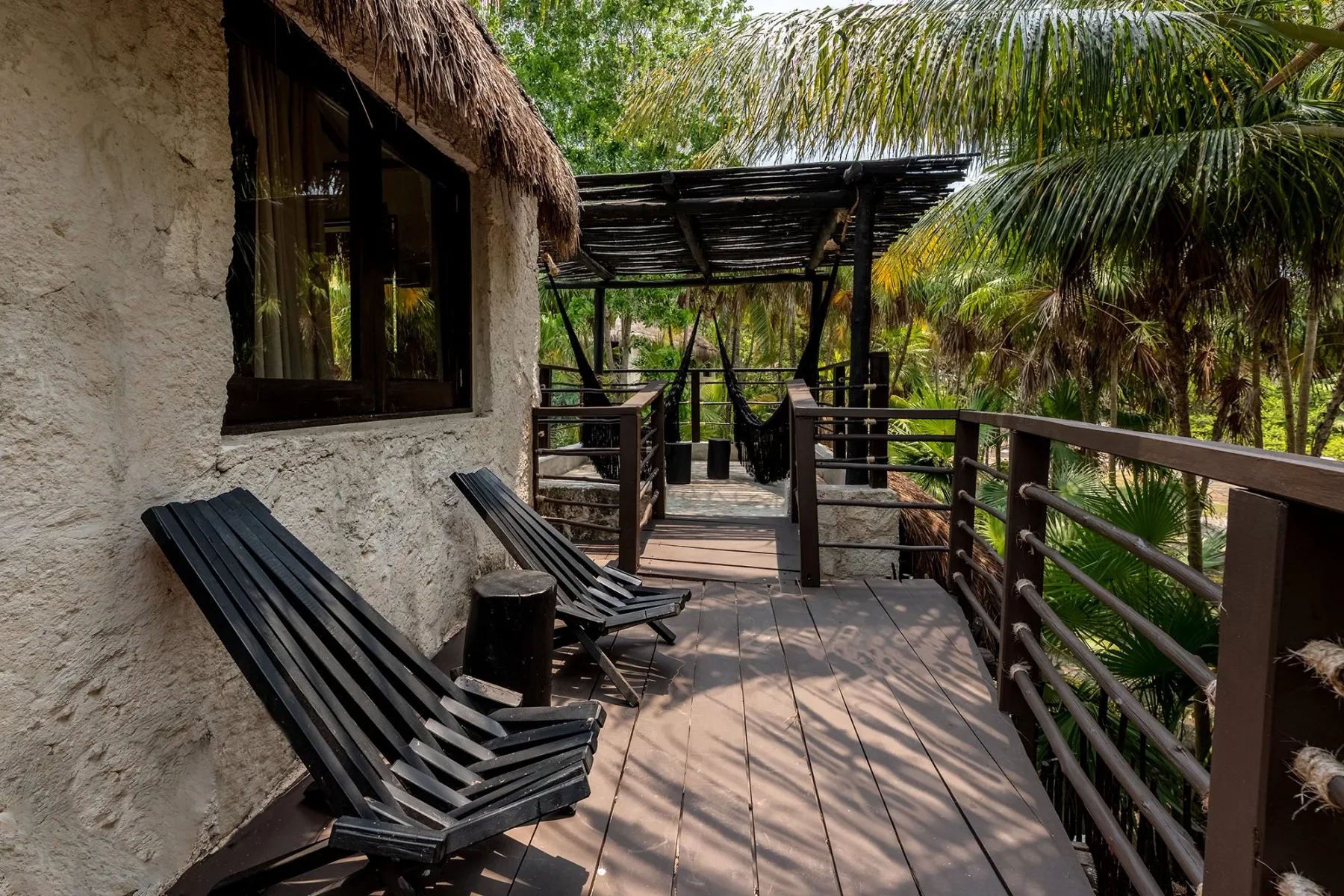 Balcony overlooking tropical greenery