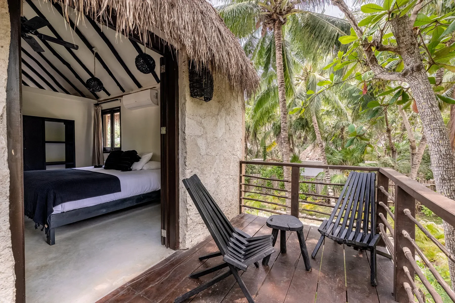 Garden Suite bedroom opening onto a balcony