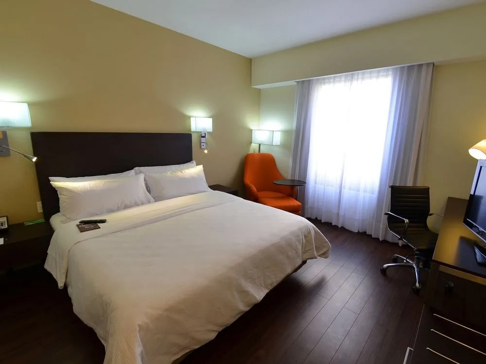 King bed and desk in a Superior Room