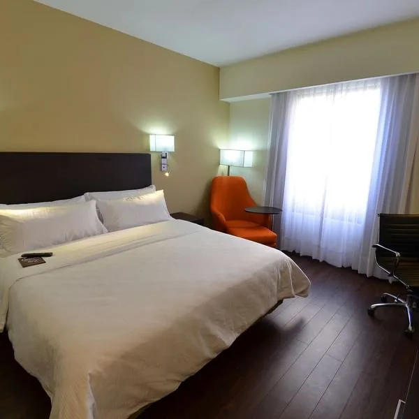 King bed and desk in a Superior Room