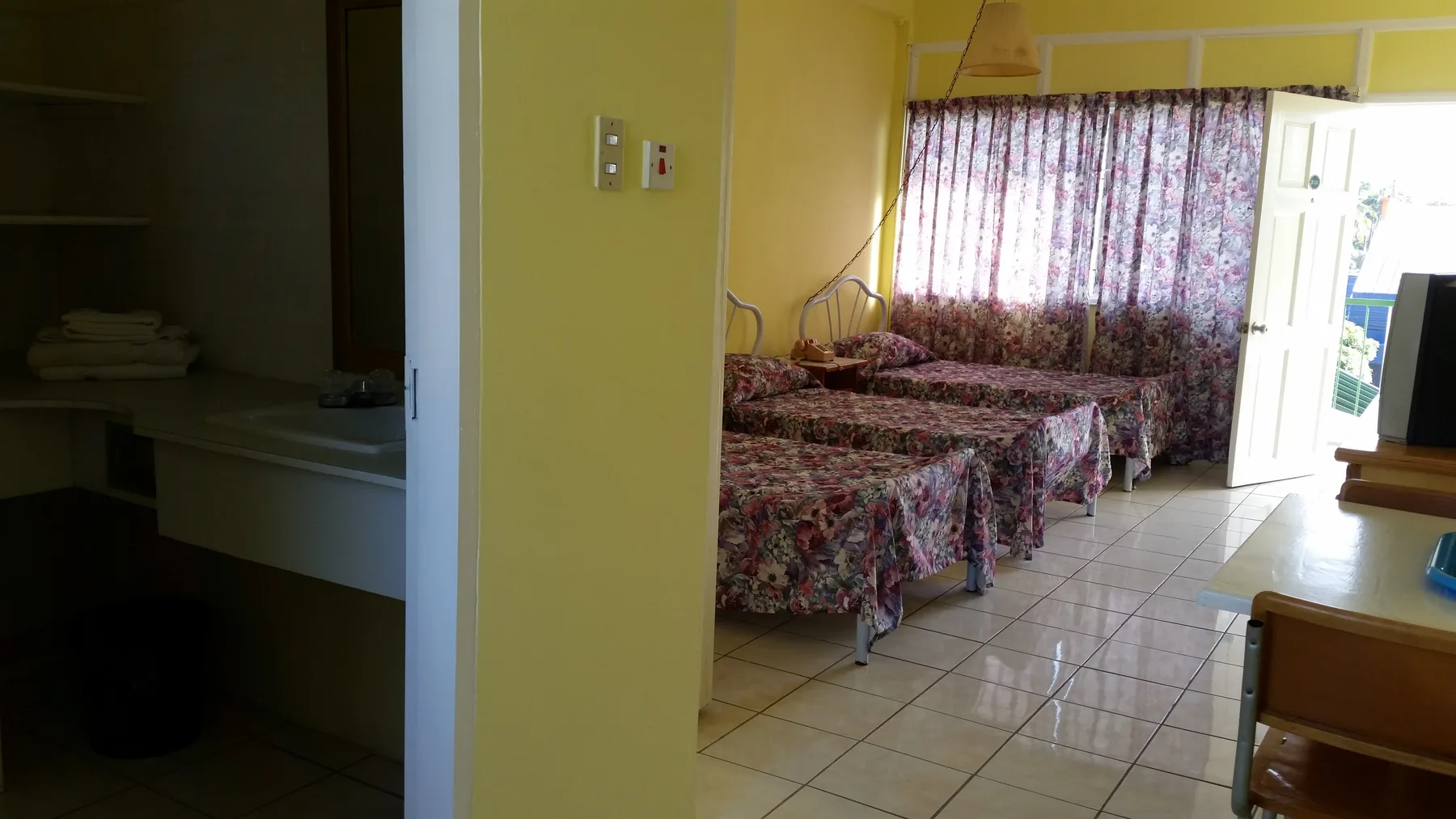 Room with three beds