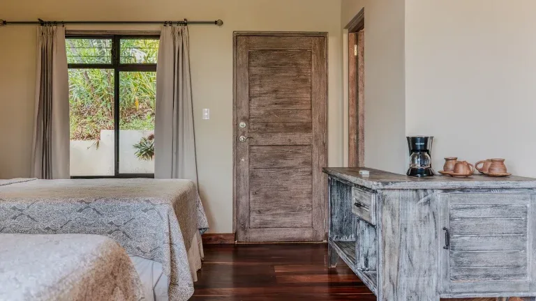 Double Queen Garden View room with two beds and coffee station