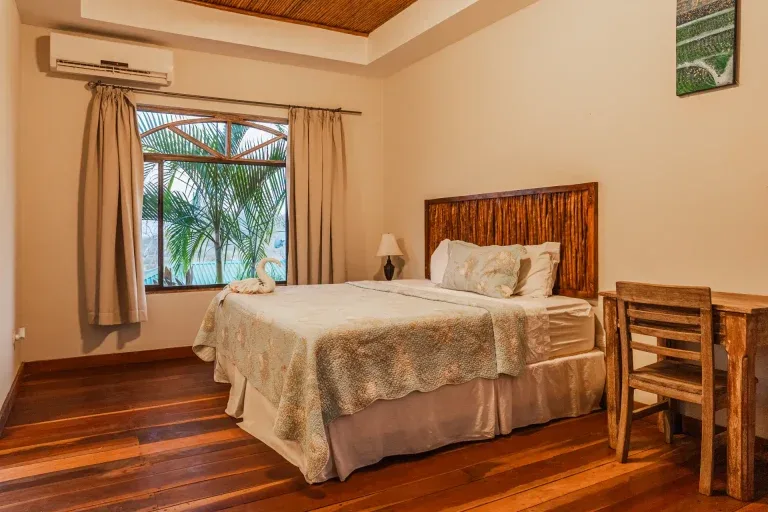 Studio sleeping area and tiled floors