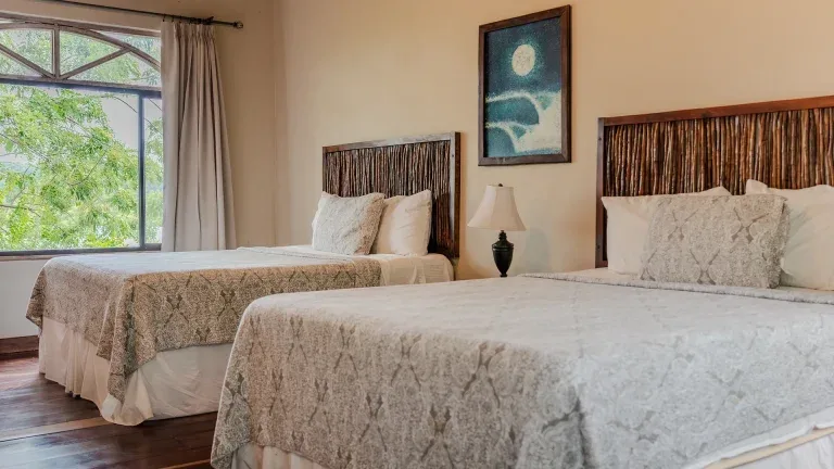 Two queen beds in a Double Queen Garden View room