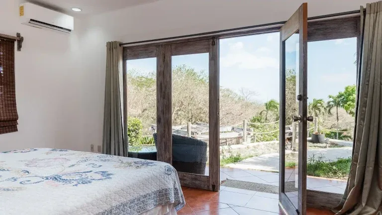 King Standard Pool View room with balcony and garden access
