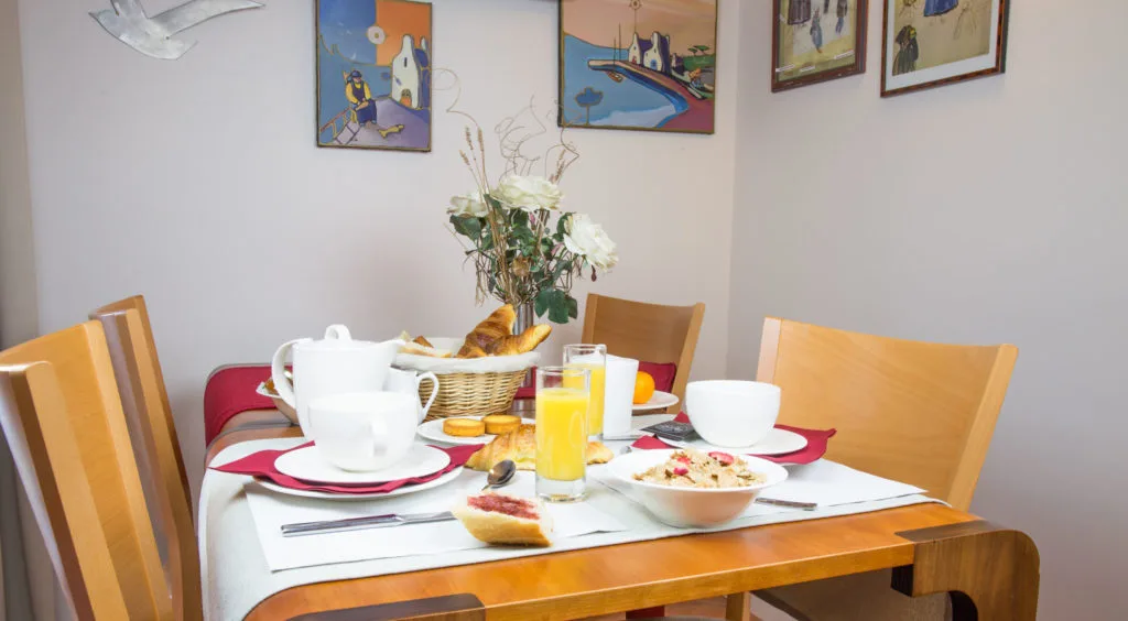 Breakfast served on a flowered table