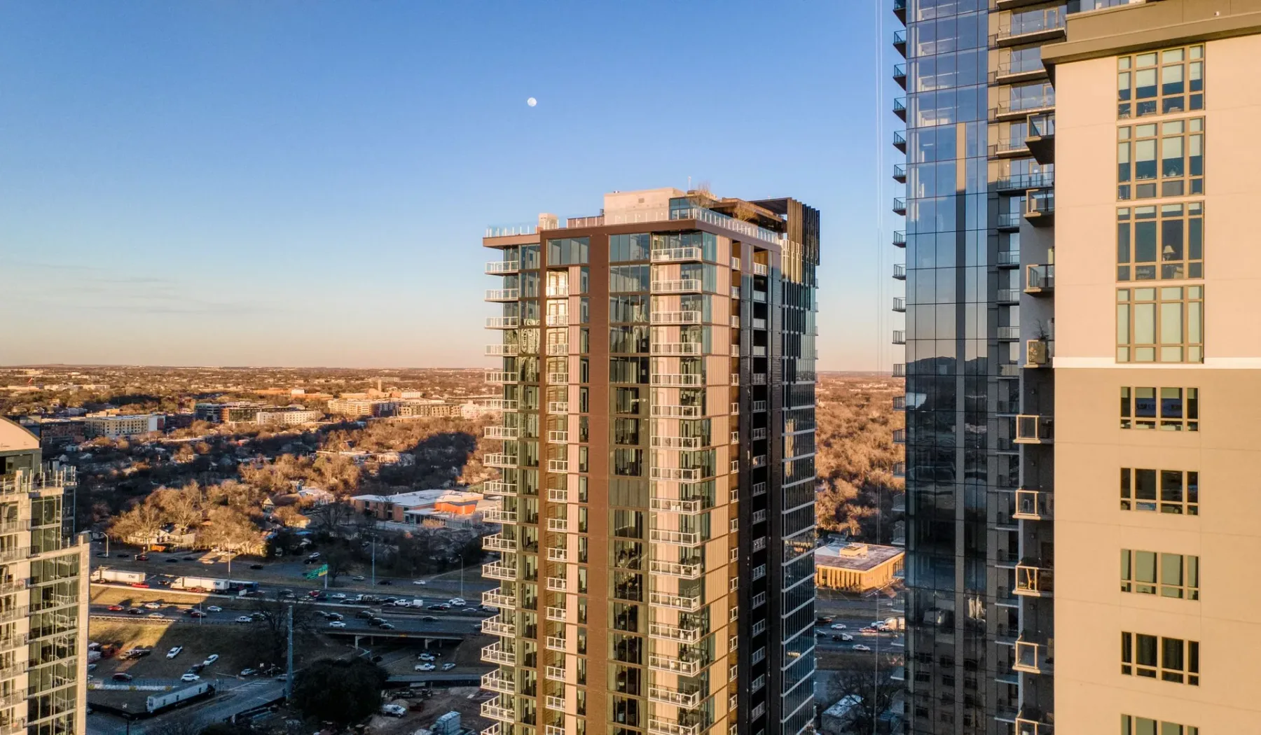 Cityscape with high-rise buildings and a broad view of the surrounding area.