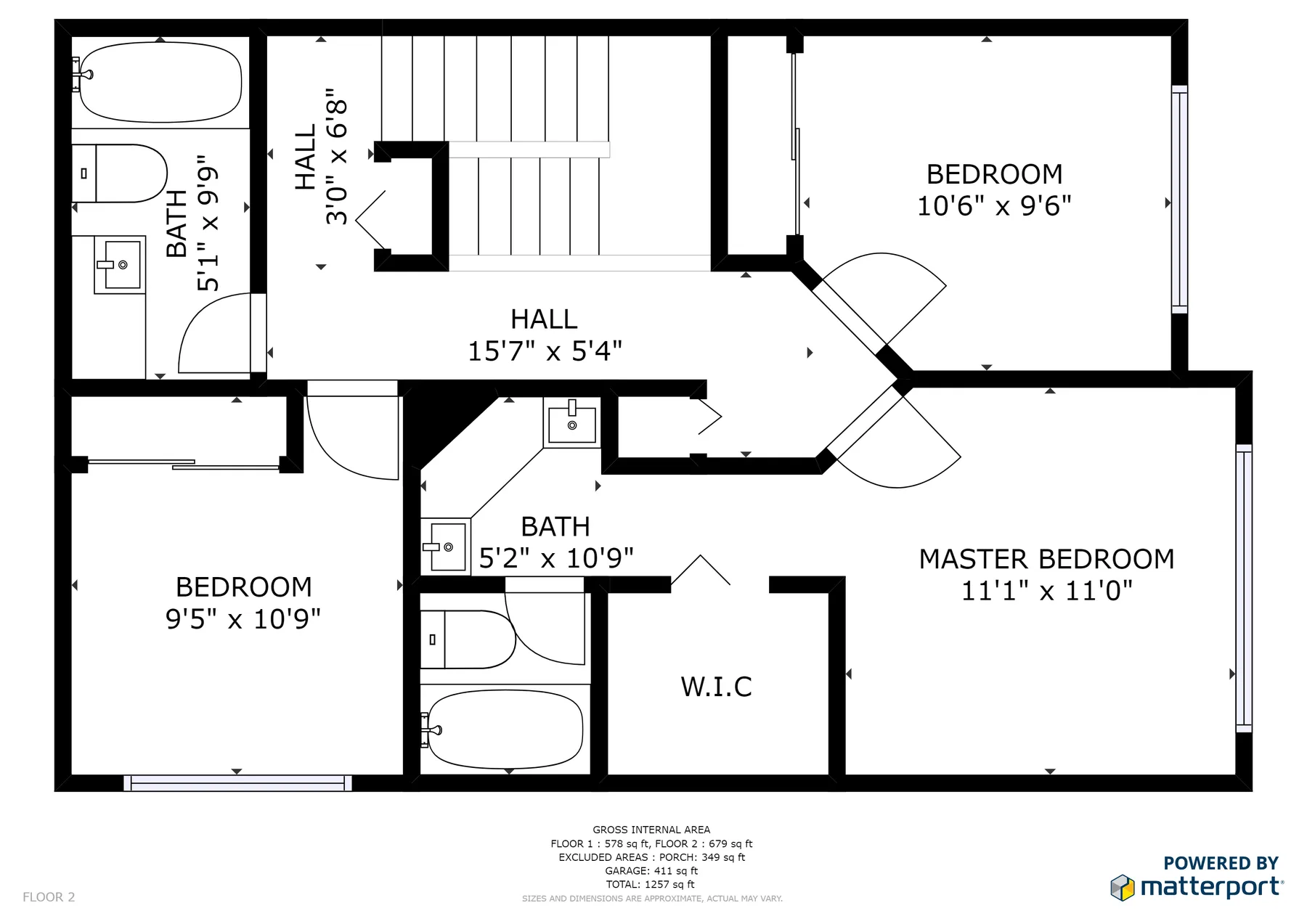 Un plano de vivienda muestra dormitorios, baños, un pasillo y un vestidor.