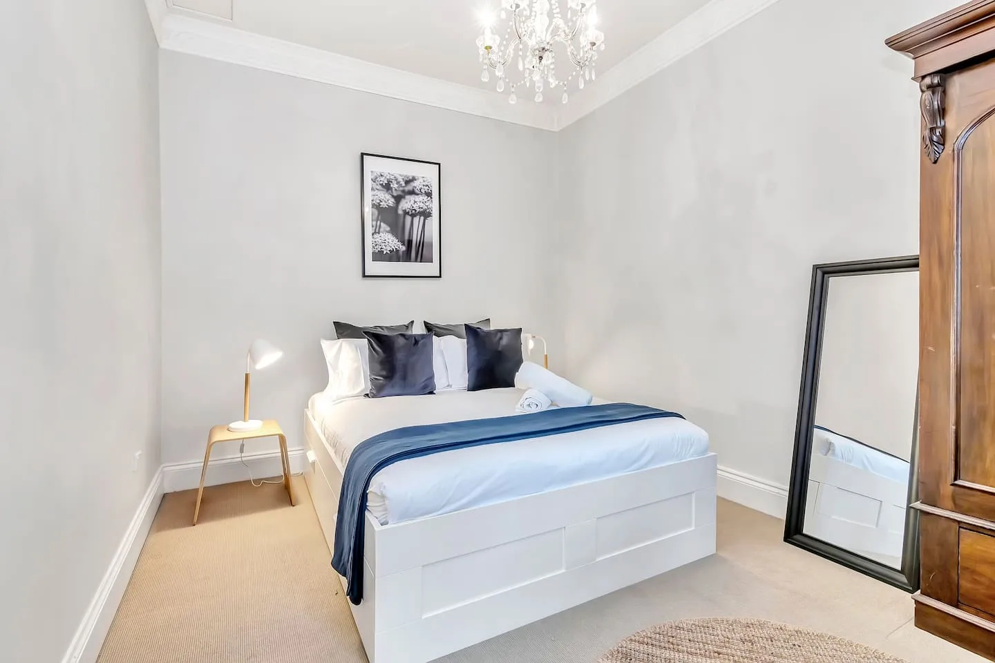 The classic bedroom is beautifully designed with a queen-sized bed and wardrobe space for storing your belongings.