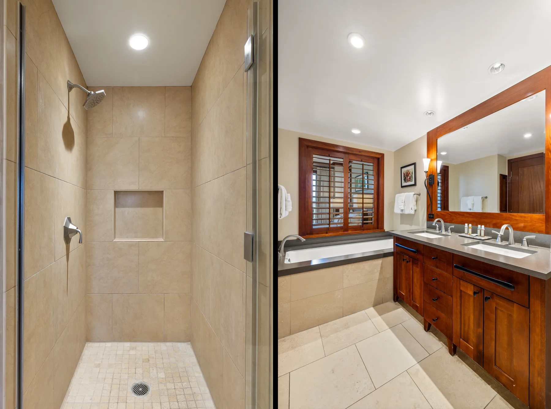 Un baño con ducha revestida de azulejos y un largo mueble de madera.