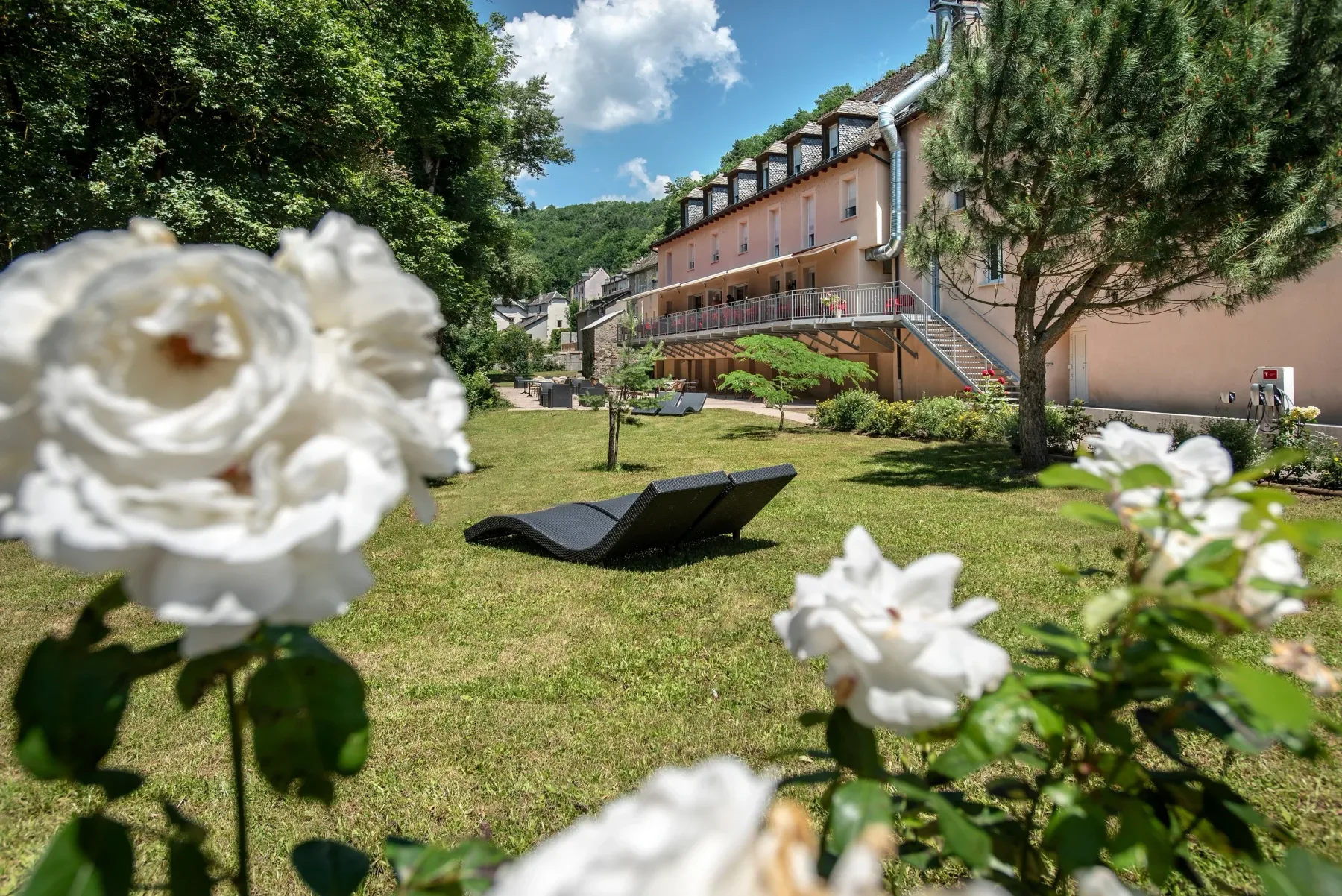 Flowering garden and hotel building
