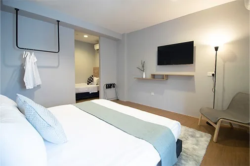 Habitación familiar con camas queen e individuales