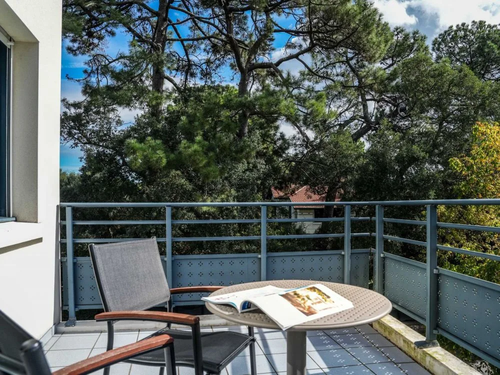 Terrace with wooded view