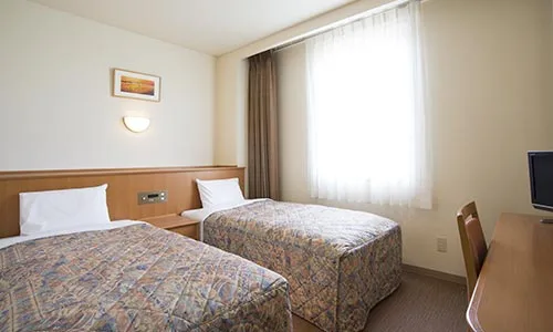 Habitación con dos camas individuales