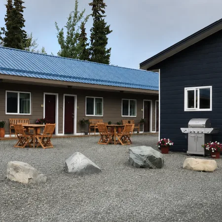 Outdoor seating area with patio furniture and barbecue
