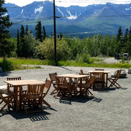 Outdoor seating and tables with mountain view