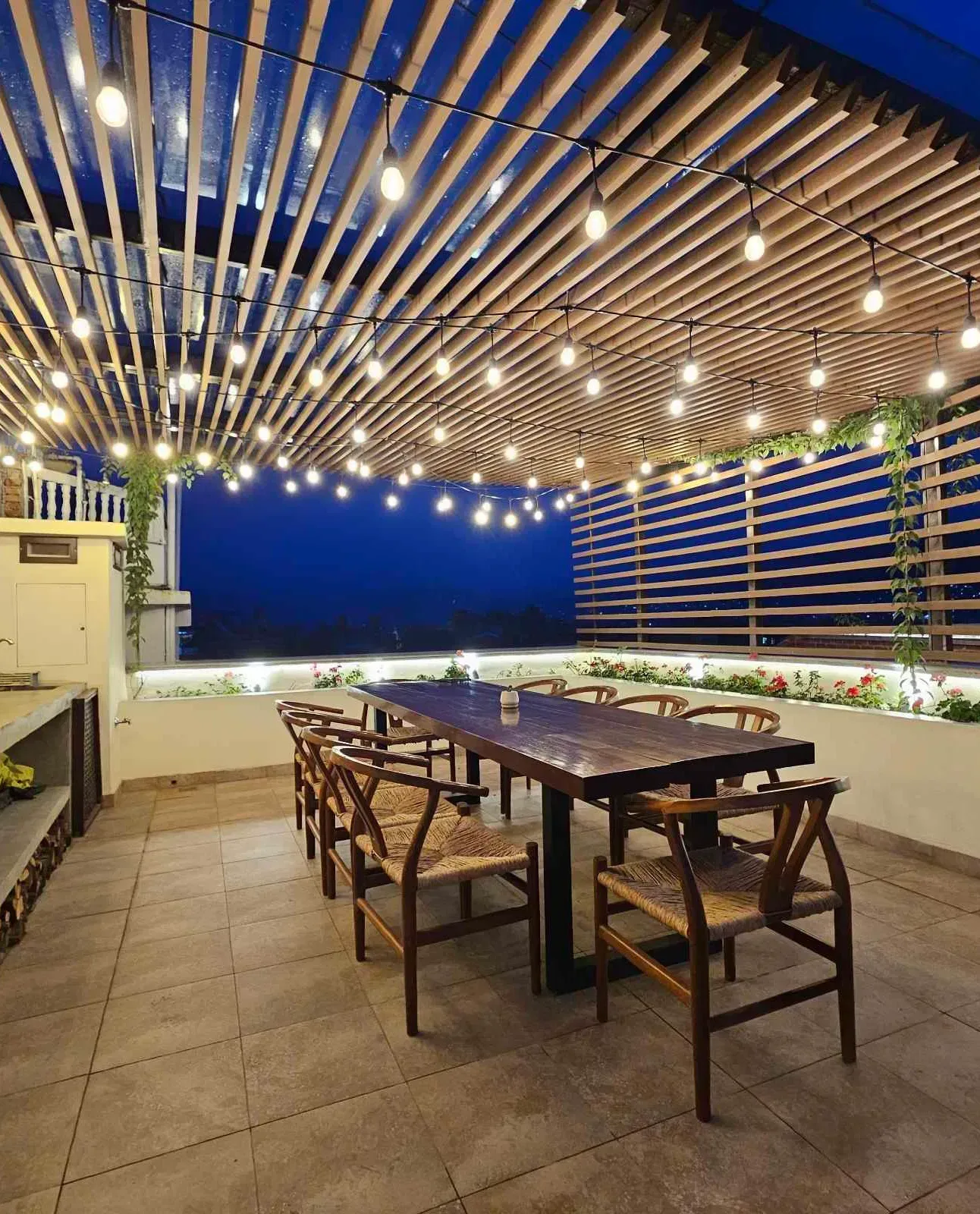 The rooftop Nanee Chef’s Table with decorative lighting.
