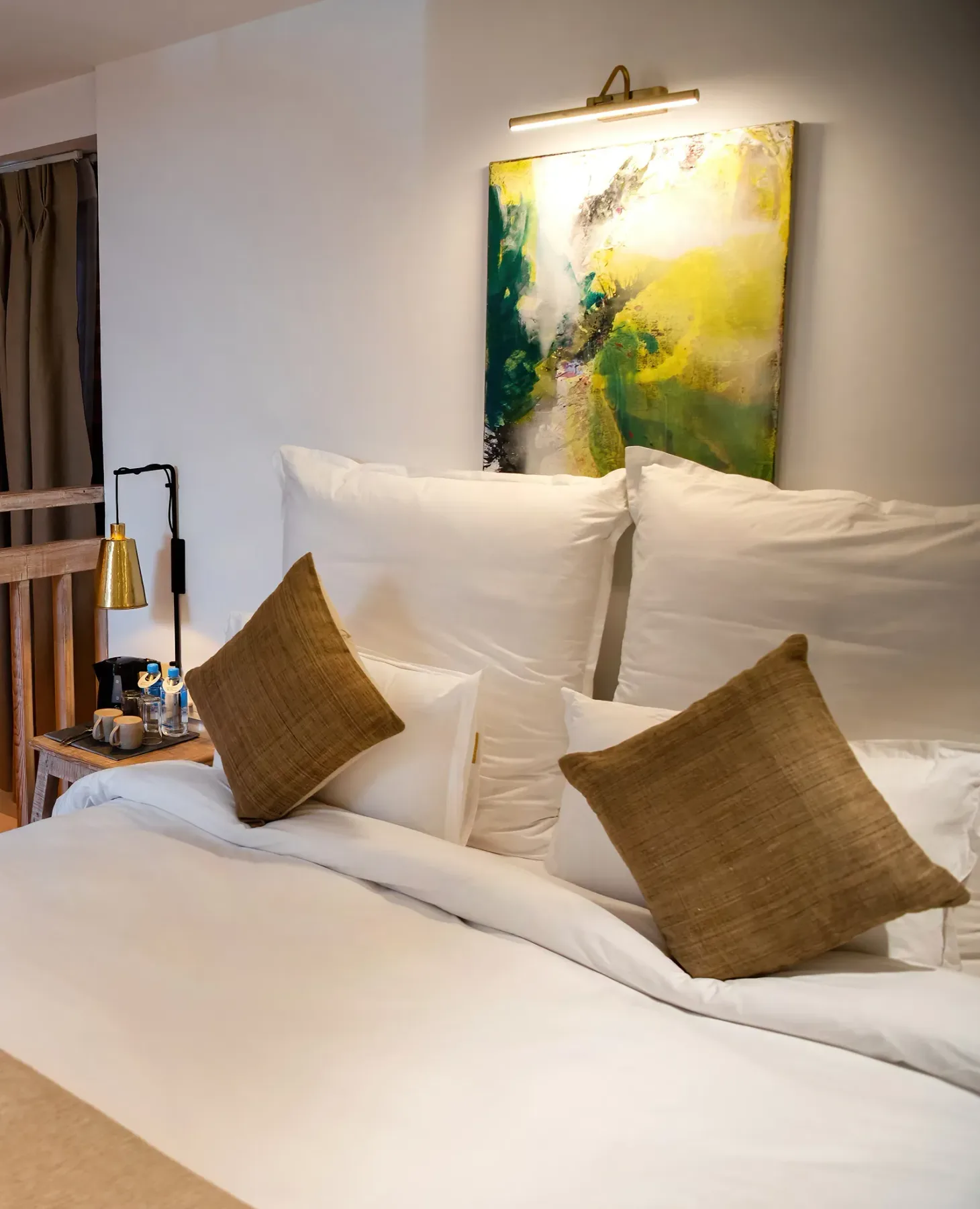 Loft suite with a staircase leading to the sleeping area.