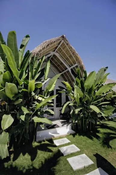 Garden path to a Balinese lumbung room