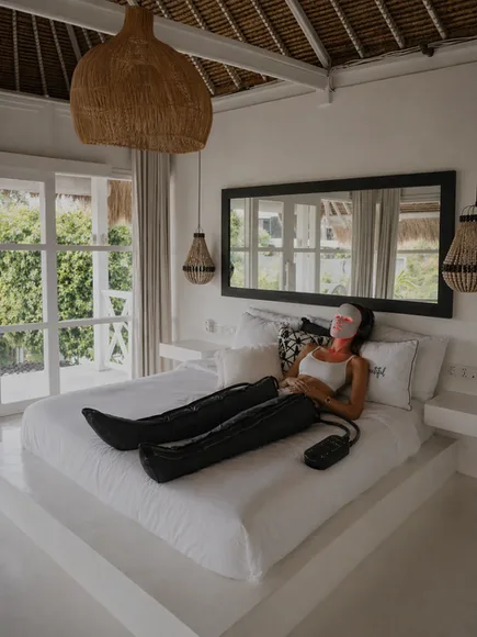 Guest using recovery equipment in the Sanctuary Suite