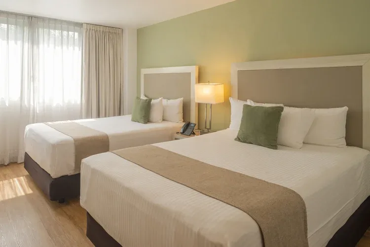 Stanza Hotel CDMX double room with two double beds and natural light