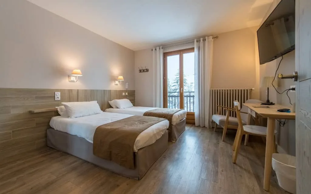 Habitación superior con dos camas individuales