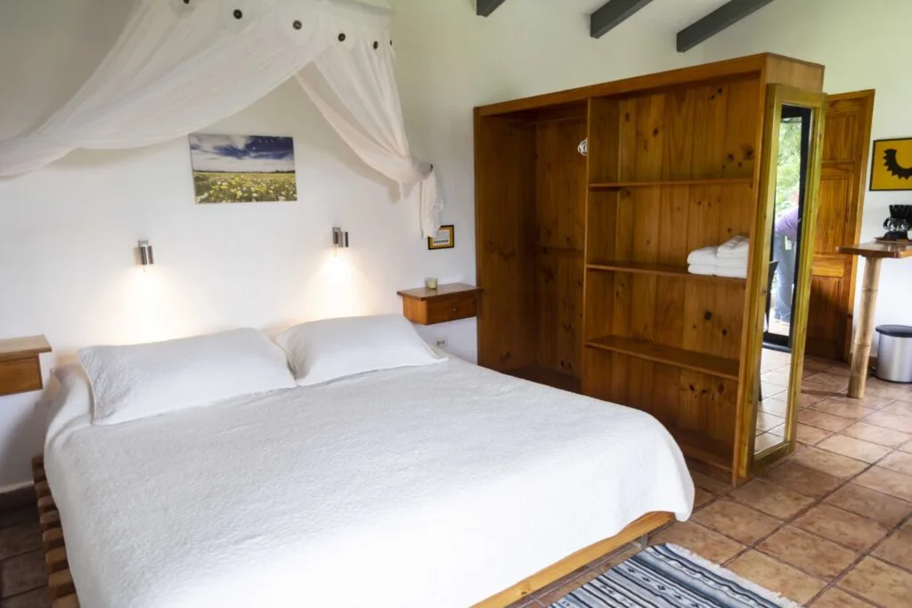 Cama king de la suite de la planta superior