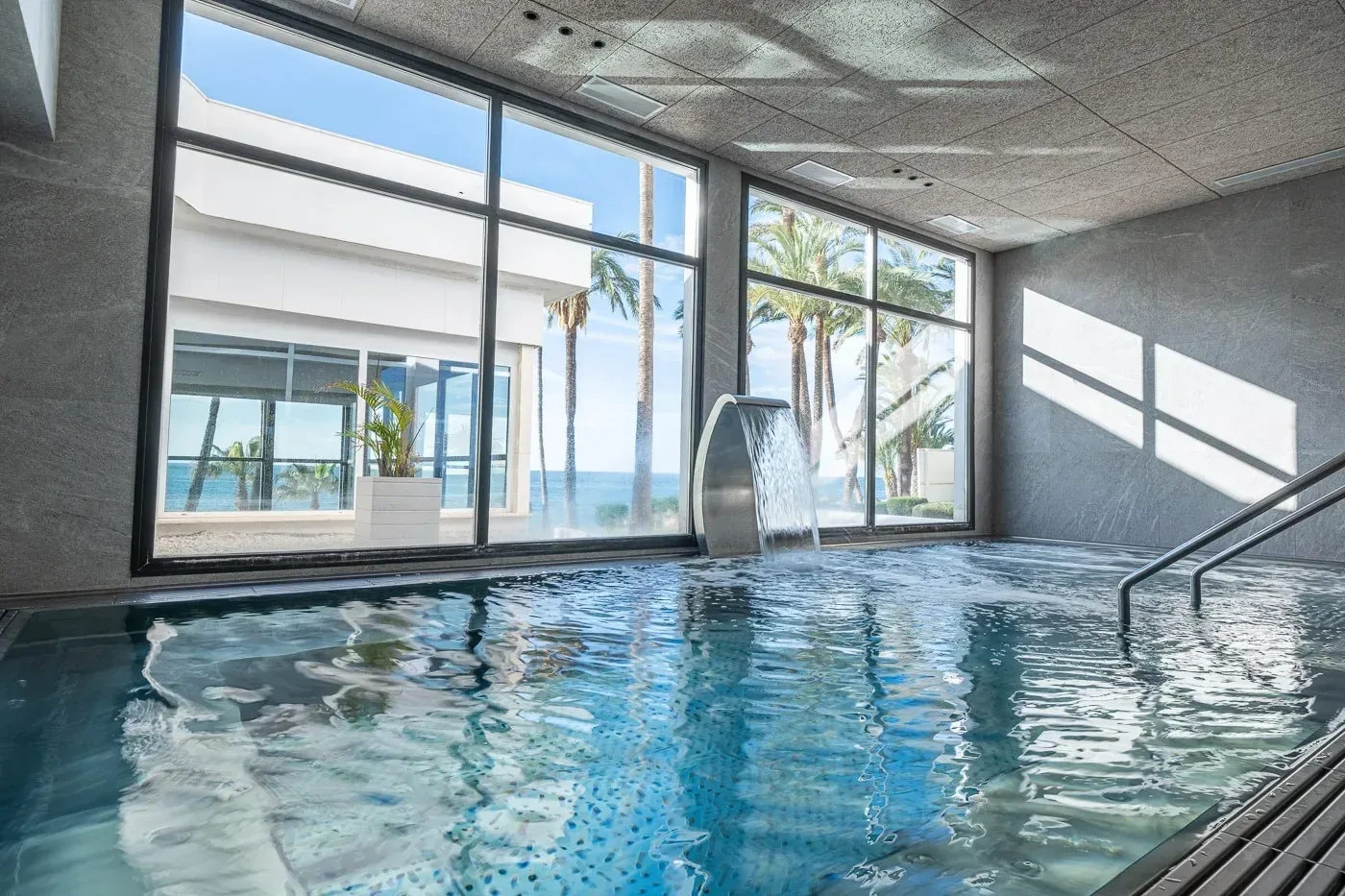 Heated pool with waterfall