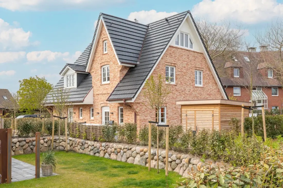 Hausteil mit ca. 144m² Nutzfläche im UG/EG/OG/DG für bis zu 7 Personen.