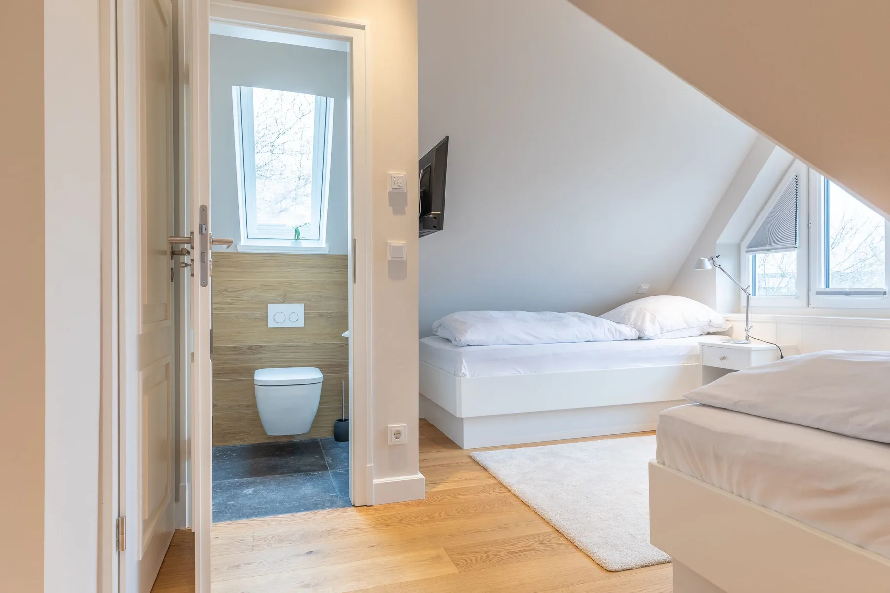 Hausteil mit ca. 144m² Nutzfläche im UG/EG/OG/DG für bis zu 7 Personen.