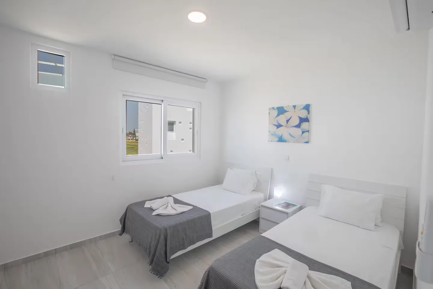 Twin bedroom prepared for guests