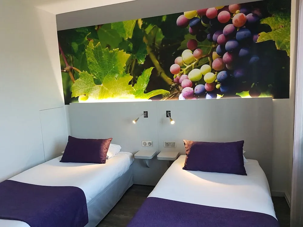 Habitación superior con dos camas individuales