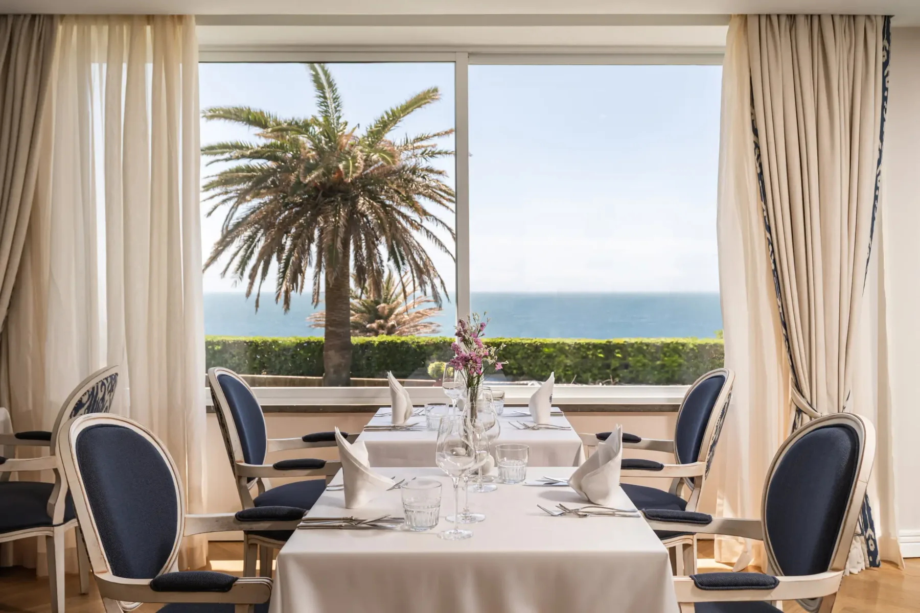 Restaurant dining room with sea view.