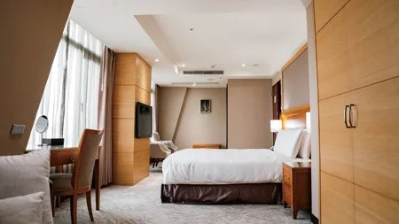 Habitación Lijing con una cama grande