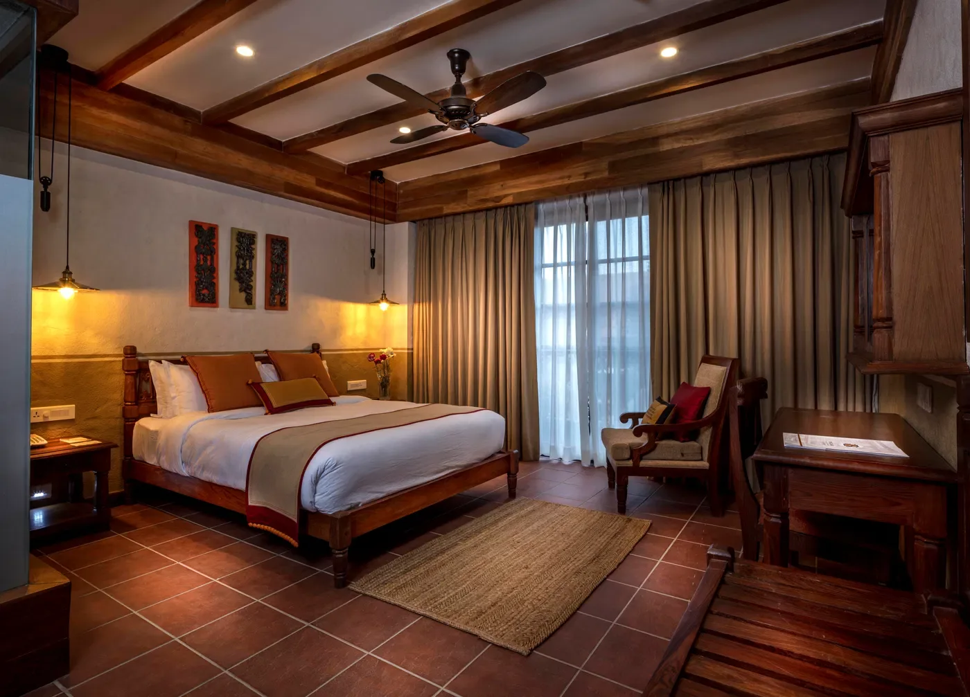 Heritage Deluxe Room with balcony overlooking the Kathmandu skyline.