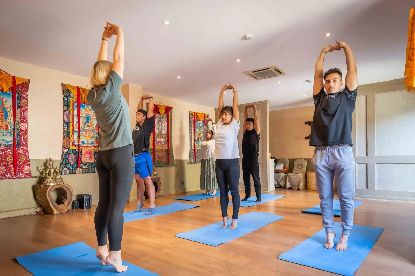 Guests stretching during a complimentary morning yoga class.