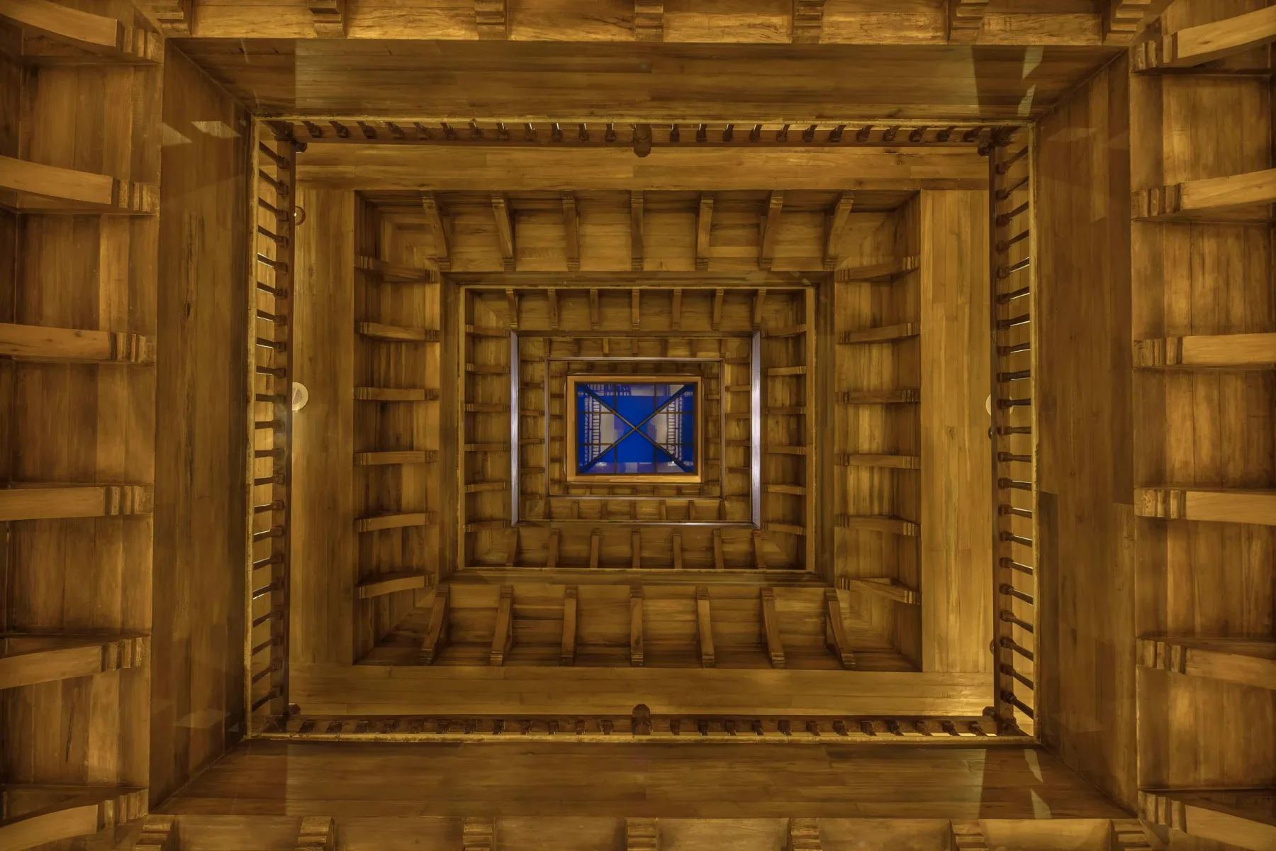Looking up through the Heritage Wing’s hand-built timber atrium.