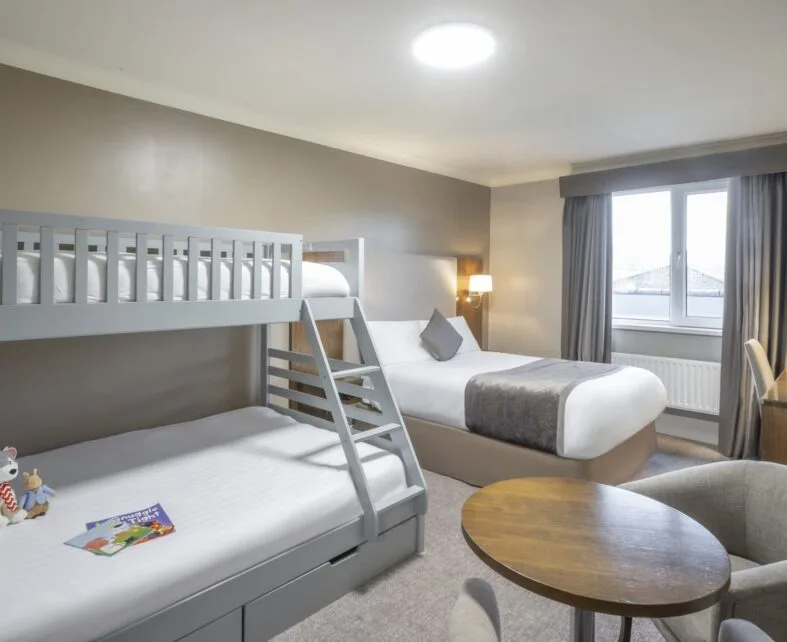 Family room with triple bunk beds