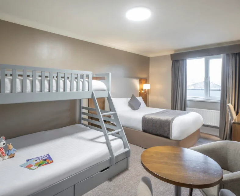 Family room with triple bunk beds
