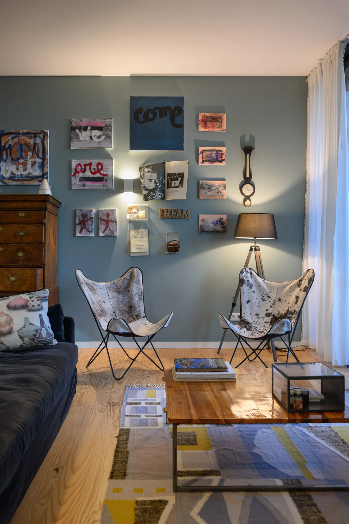 Living room with books and paintings