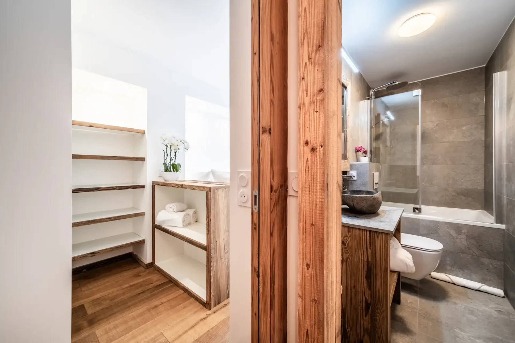 A bathroom with a bathtub and sink.