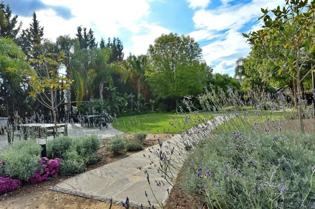 Stone path through the lavender and tropical gardens