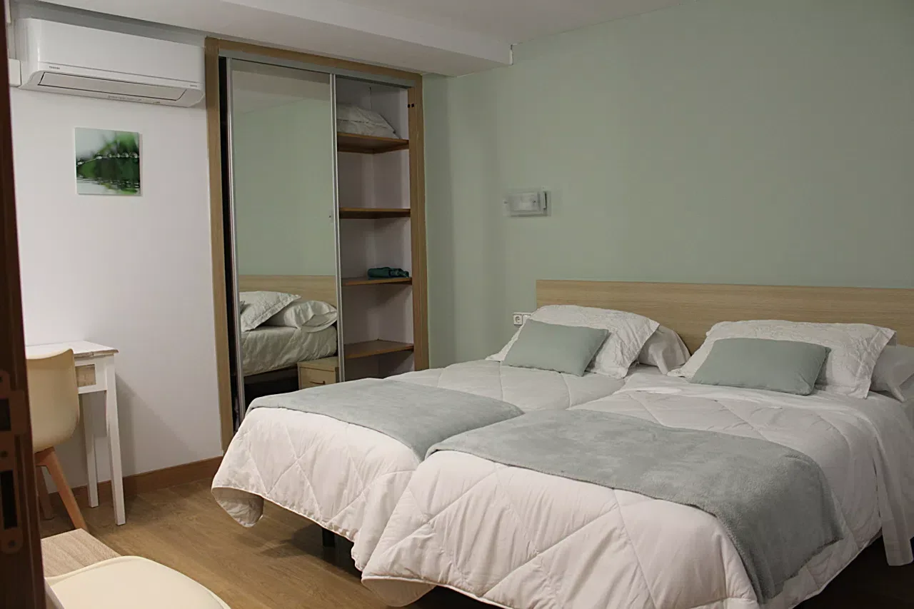 Interior double room with external private bathroom