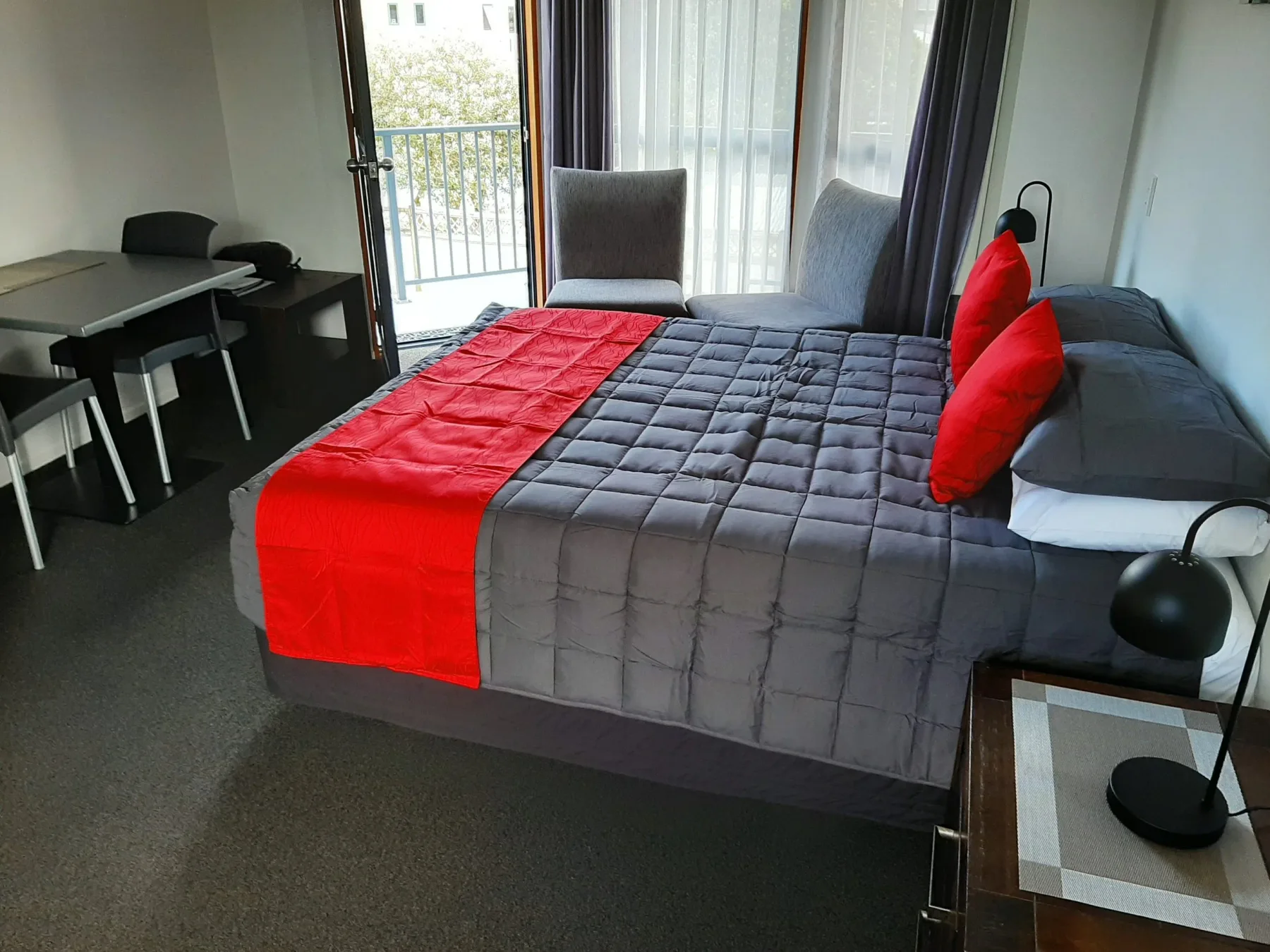 Unit 9 room with bed and sitting area