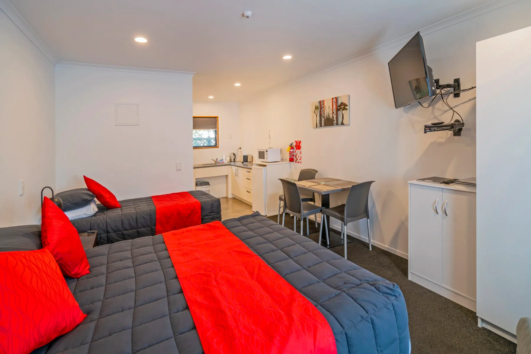 Unit 2 interior with beds and kitchenette