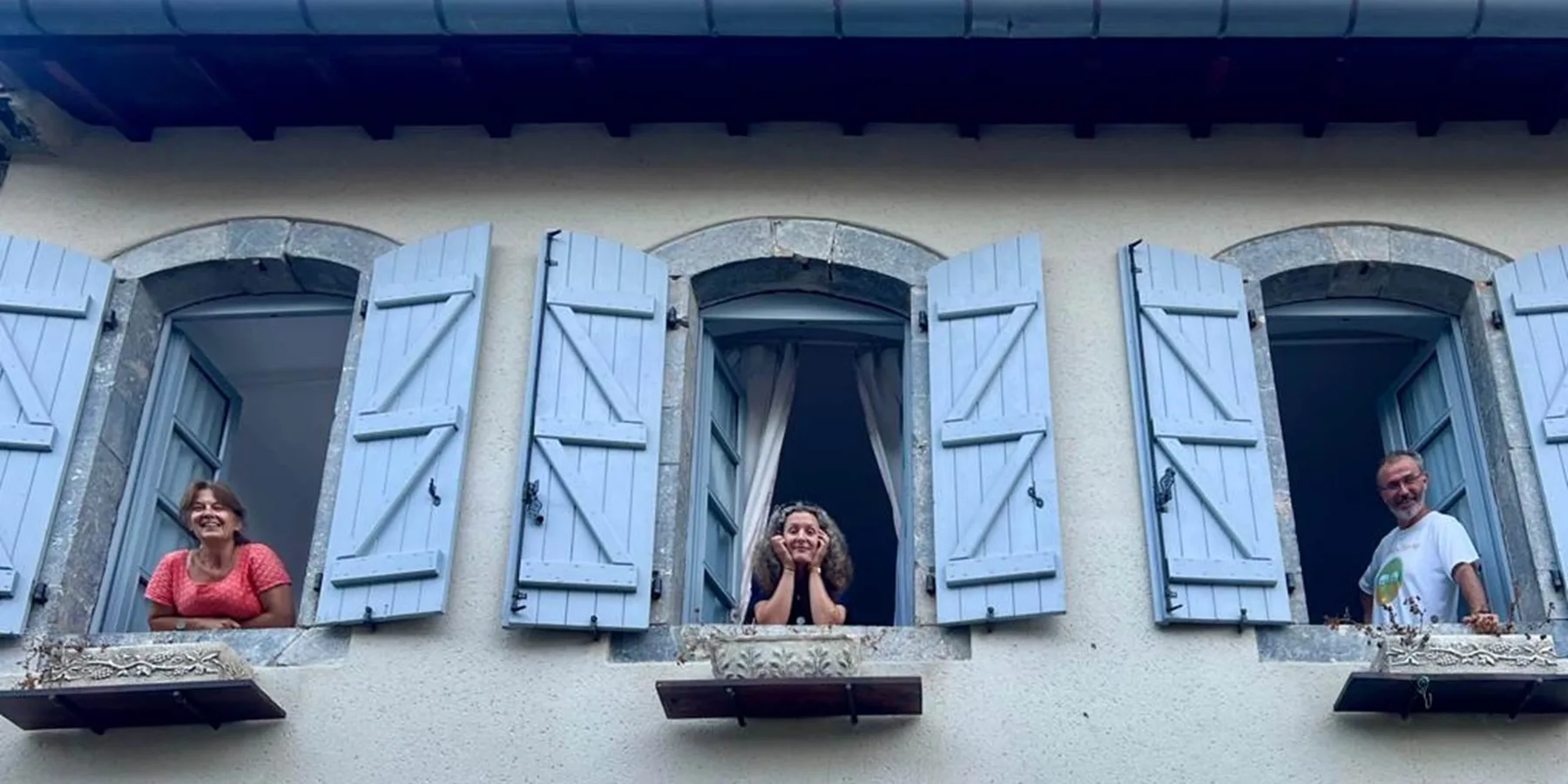 Guests at a room window