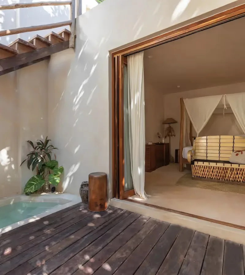 Suite with plunge pool and indoor-outdoor access.