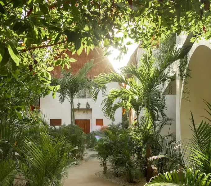 Garden pathway leading through the hotel grounds.